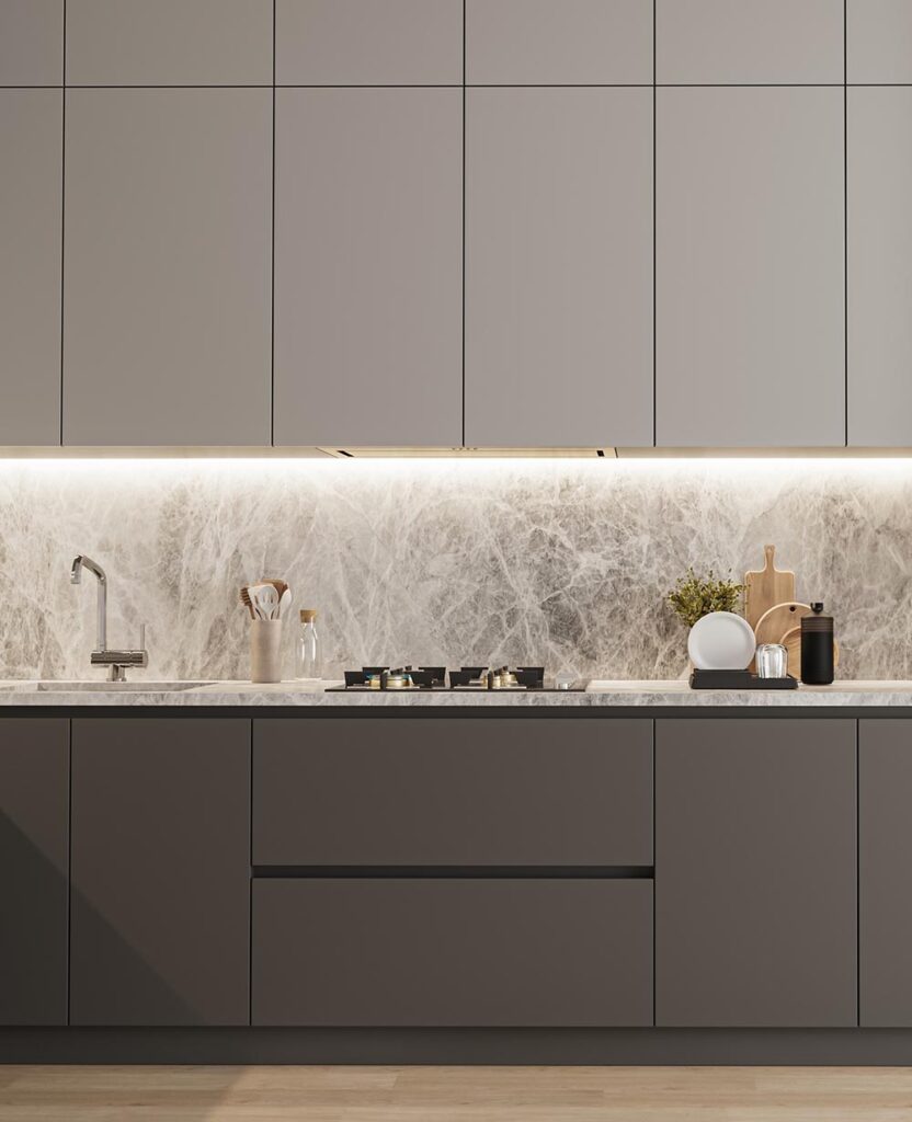 Luxury kitchen and home remodeling in Bloomfield Township featuring a marble waterfall island and custom lighting.